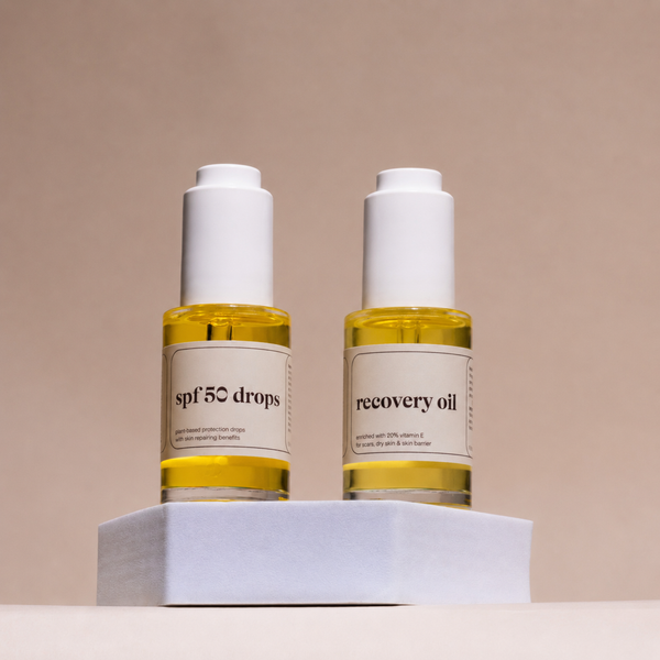 spf 50 drops & recovery oil duo staan naast elkaar